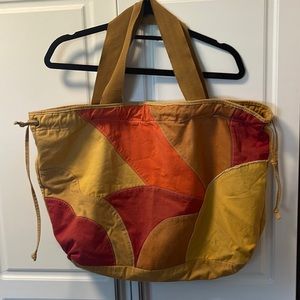 Drawstring weekend bag with multicolor front
